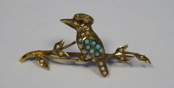 Gold metal Australian kookaburra bar brooch set with seed pearls and turquoise stones, mark to