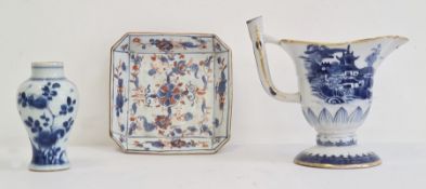Early 19th century Chinese export porcelain blue and white helmet-shaped jug, painted with a