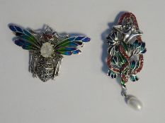 Silver, marcasite and plique a jour enamel dragonfly brooch, having facet cut white stone body and