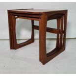 Nest of three teak 20th century coffee tables