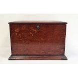 Late 19th century oak table-top desk tidy, the lift-up top enclosing compartmented interior, with