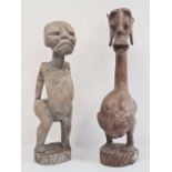 African carved fertility figure, 36cm high and another Grebo-style carved figure, 33cm high (2)