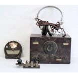 The Magniphone 2000 ohms transmitter with headphones plus morse code tapper and "Calendox"