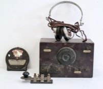 The Magniphone 2000 ohms transmitter with headphones plus morse code tapper and "Calendox"