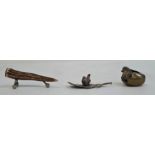 A cast bronze baby bird in cracked egg, 3cm high, another cast bronze bird on leaf and a horn