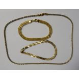 9ct gold woven flat bracelet, a 9ct gold mesh collarette necklace and a 9ct gold open mesh bracelet,