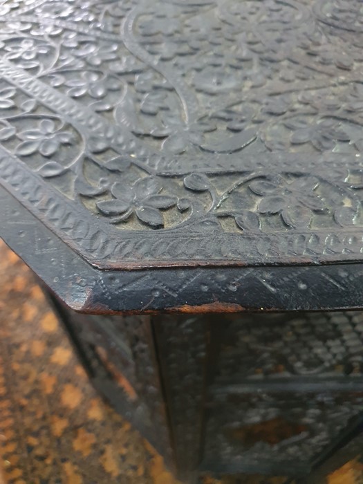Anglo-Indian octagonal centre table with relief carved top with allover foliate decoration on - Image 16 of 16