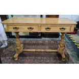 19th century pine side table, the rectangular top with rounded corners with two drawers, turned