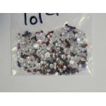 Bag of loose mixed stones including cubic zirconia, ruby, sapphire, emerald, amethyst, garnet and