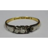 Platinum, 18ct gold and three stone diamond ring set three small stones (one missing)