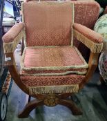 Early 20th century oak framed chair by Parker Knoll in pink ground patterned upholstery, curved x-