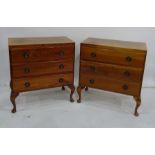 Pair of 20th century chests of three drawers on cabriole legs (2)