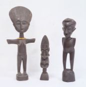 African carved female figure with beaded necklace, another African carved figure and an African