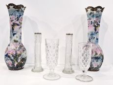 Pair of Japanese porcelain tall vases with scalloped rims decorated with butterflies and