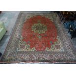 Pink ground Eastern rug with central medallion, foliate decorated field and stepped foliate