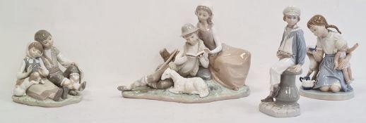 Lladro figures of boy and girl with puppy, a young girl with sailing boat, a girl with doll,