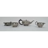 Hammered pewter three piece tea set and a two handled dish (4)
