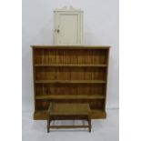 Pine open bookcase with plinth base, string top stool and cream painted wall hanging cabinet 112 x