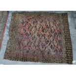 Eastern wool rug with geometric all over tree of life design on brick red ground (worn) 146 x 117