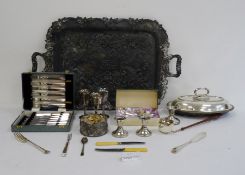 Two-handled rectangular silver-plated tray, a cased set of plated knives, candlestick holders,