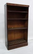 Possibly late 19th century mahogany open bookcase on plinth base, 73cm x 135cm