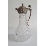 LATE 20TH CENTURY silver-mounted cut glass claret jug, London with pinecone finial, mask spout and