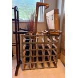 Wine rack, riding crop, a vintage tennis racket, etc.