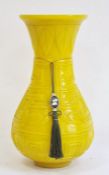 Chinese carved yellow Beijing glass vase, of baluster form with everted neck, carved with key