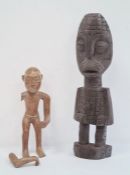 African carved wooden figure of a man holding stick (broken) and another African carved figure (2)