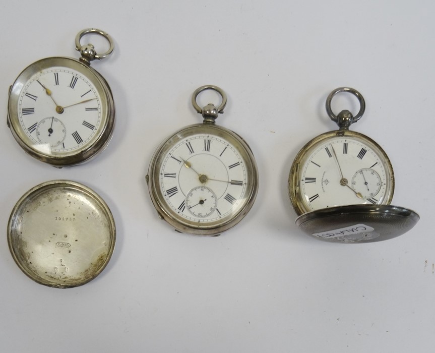 Three various pocket watches including a Rotherhams silver-cased hunter watch with Roman numerals to
