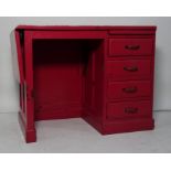 Pink painted desk with drop leaf and pull-out writing slide, four drawers, plinth base