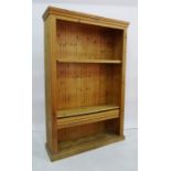 Modern pine open bookcase with fluted pilasters and adjustable shelves, plinth base, 119cm x 182cm