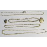 Gold coloured oval locket, Victorian heart-shaped locket and 4 simulated pearl necklaces (6)