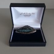 Agate brooch in silver mount featuring hand painted miniature image of dolphins. Signed Wendy