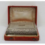 Victorian silver rectangular lidded box, floral relief and engine-turned decorated 'Presented to
