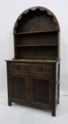 20th century oak arched top dresser with open shelves above two drawers, two cupboard doors, 91cm