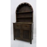 20th century oak arched top dresser with open shelves above two drawers, two cupboard doors, 91cm