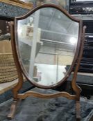 Shield-shaped dressing table mirror and an oval dressing table mirror, both with mahogany frames (2)