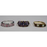 9ct gold, amethyst-coloured stone and diamond dress ring set three small diamonds surrounded by