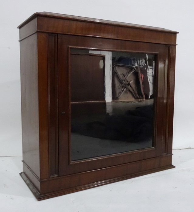 20th century mahogany table top cabinet with single glazed door enclosing shelves and marked