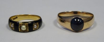 Gold coloured metal, enamel and seed pearl mourning ring and a gold coloured metal and onyx set