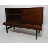 20th century, possibly G-Plan, mahogany lounge unit with one glass and one wooden sliding doors on