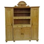 Late 19th/early 20th century continental pine dresser with moulded cornice above open shelves,