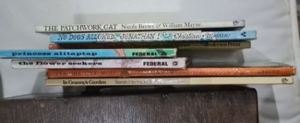 Basket of childrens books to include "The Patchwork Cat", "The Giant Jam Sandwich", "No Dogs Allowed