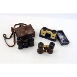 A pair of 20th Century Solus binoculars, no. 389, in fitted case and two other pairs of