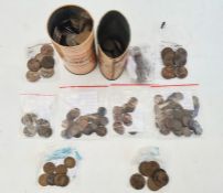 A quantity of George V farthings and a large amount of pennies