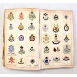 An early 20th Century scrap book of Crests to include various Halls, Hotels, Schools etc