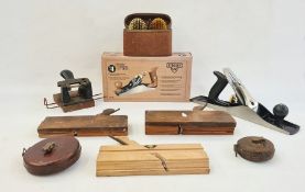 Stanley no.4 bench plane, boxed, a Clark bench plane, surveyors tapes and other woodworking tools