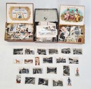 A quantity of loose cigarette cards, a cigar box of cigarette cards, a tin of cards, Churchman,