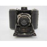 A Nagel Vollenda folding camera with Carl Zeiss Jena lens, Nr 1272921, 11cm wide